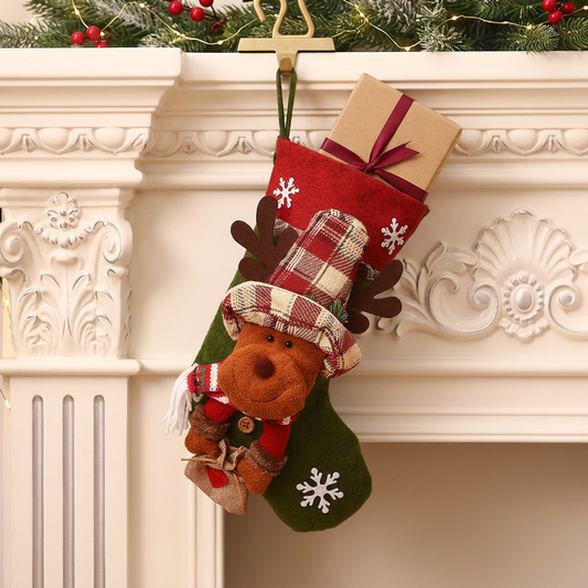 Reindeer Christmas stocking hanging beside festive mantel greenery
