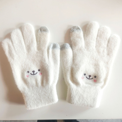 Ivory plush five-finger gloves with smiling faces, pink cheeks and gray fingertip accents